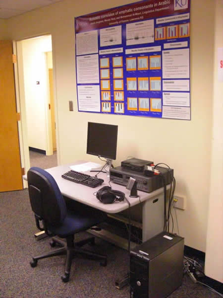 desk with computer and monitor in an office